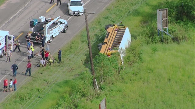 Multiple injuries reported after Crosby school bus flips