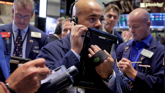 China leads Asian stocks lower on poor factory data