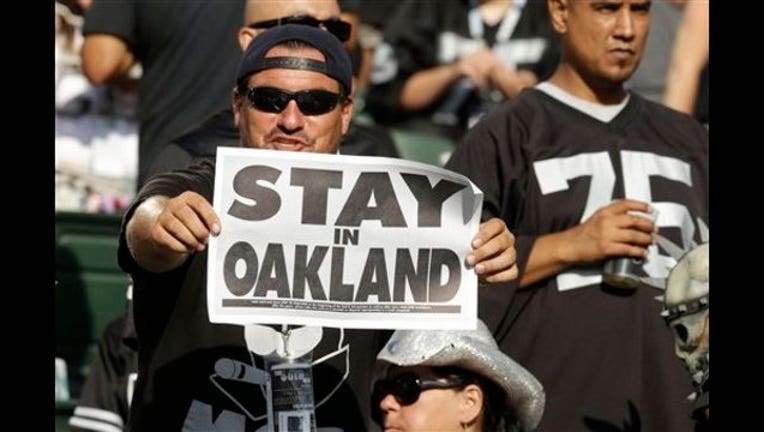87e881a8-Cardinals Raiders Football_1441058577825