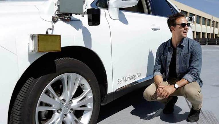 5be922cd-Driverless-Car-Driver_1443566366219.jpg