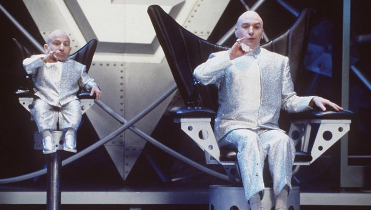 d931a38f-GETTY Verne Troyer and Mike Meyers in Austin Powers-404023