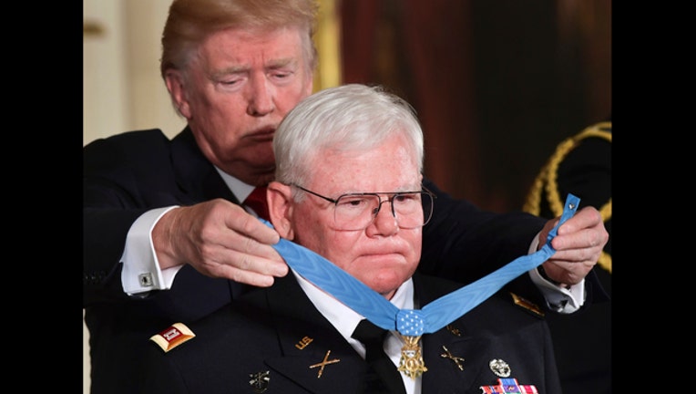 8c006eee-APTOPIX Trump Medal of Honor_1508795601843