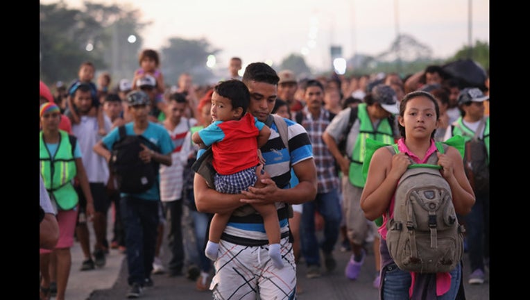 6a7c6636-GETTY_Migrant_Cara_102718