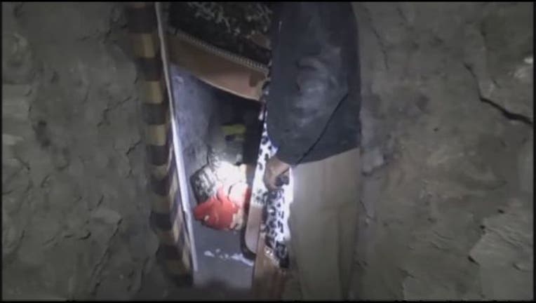 ae821303-Isis_tunnels_1448459555066.jpg