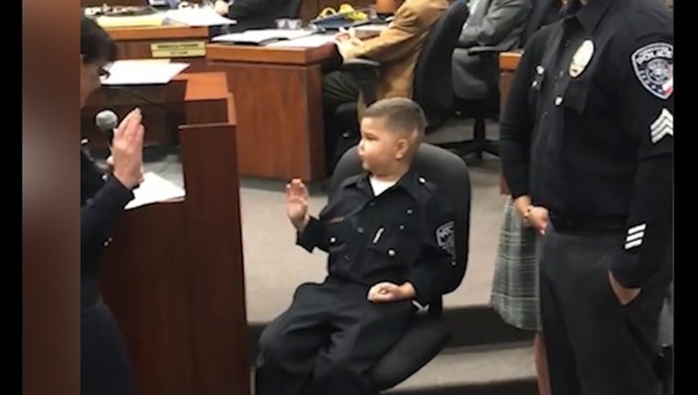 503b07a0-KTTV_kid sworn in_101818_1539884115011.PNG-407068.jpg