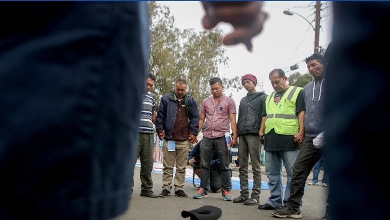 a46b38ed-Migrant caravan Tijuana_1543178379040.PNG.jpg