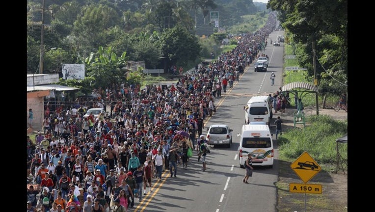 e6451386-GETTYIMAGE_Migrant caravan_102118