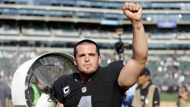 Ravens-Raiders-Carr_1443070033159.jpg