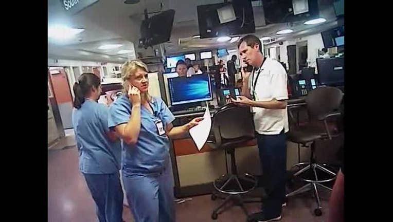 c828da42-Screaming_nurse_arrested__dragged_from_h_0_20170901175130-65880