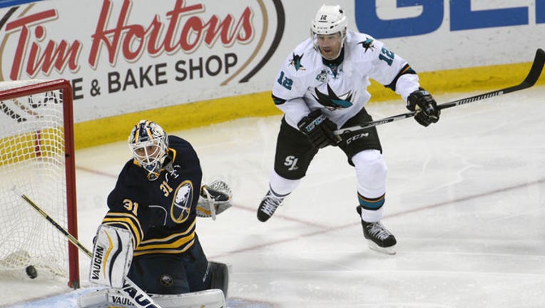 719c2bc1-Sharks-Sabres_1447623534135.jpg
