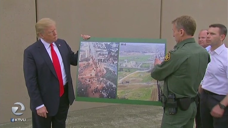 66695575-Trump_views_designs_for_border_wall_whil_0_20180314052204