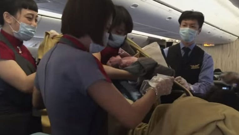 384bdc51-baby delivered on flight