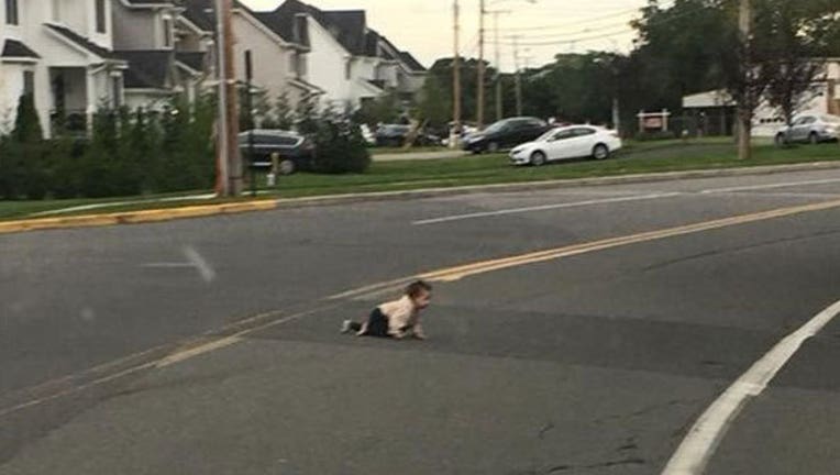 091a5049-baby-in-road_1537816454185-402970.jpg