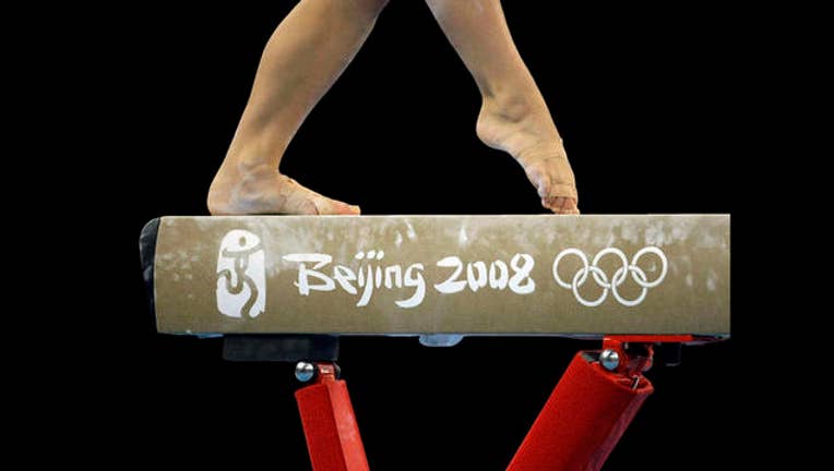f0d23ea4-balance_beam_1470322429879.jpg