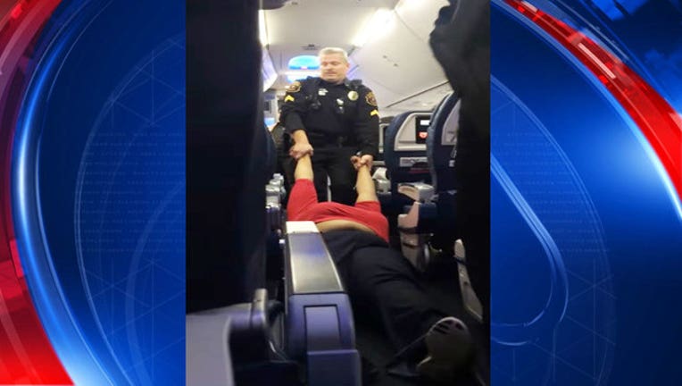 ef3bfd6b-dragged-off-plane2_1481595972704-65880.jpg