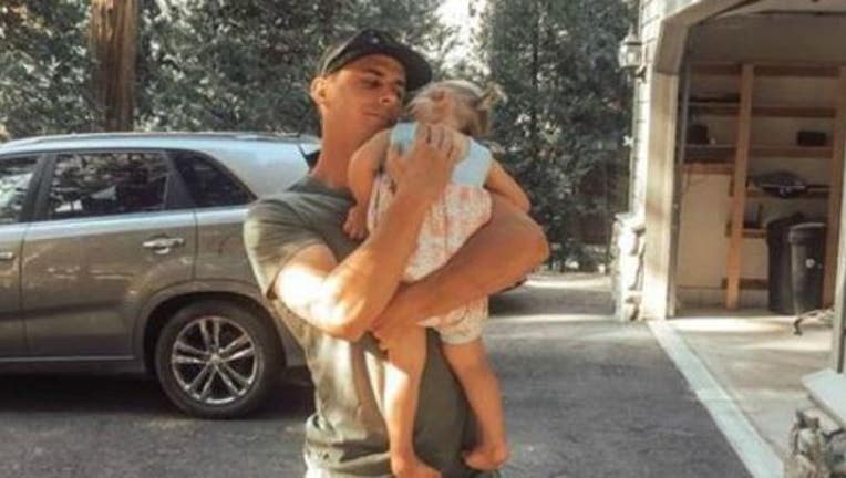 1328ec4e-firefighter_hugs_daughter_16x9_1536082436206.JPG