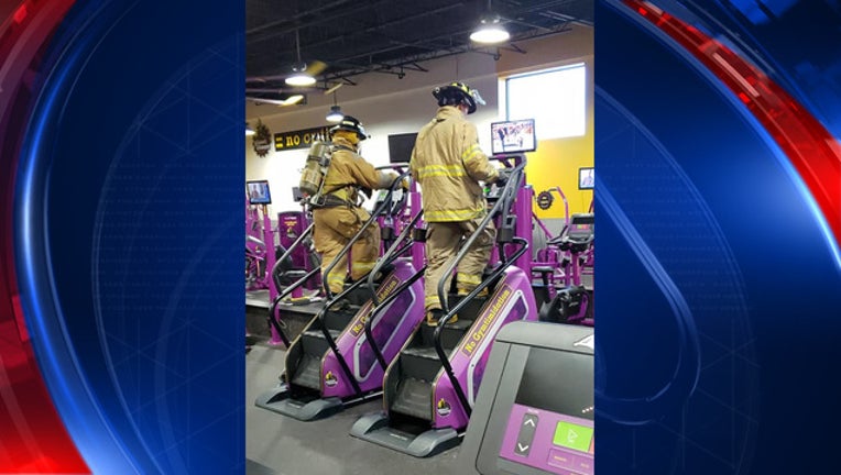 7dc9a64f-firefighters climb stairs_1536692644601.jpg-408200.jpg