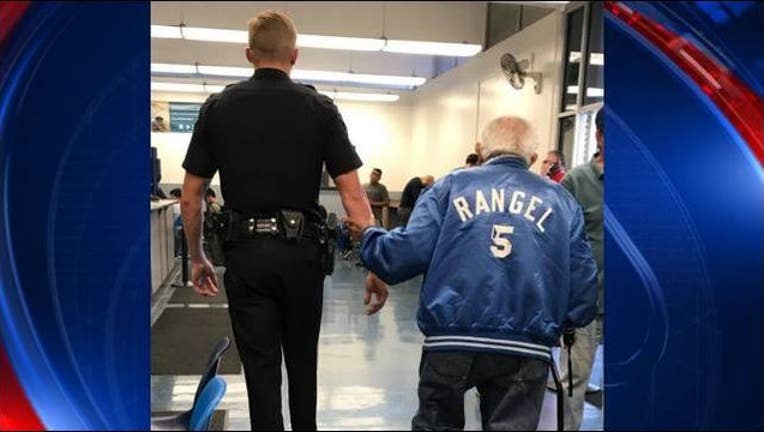 fea86404-officer takes man to dmv_1506335539476-404959.JPG