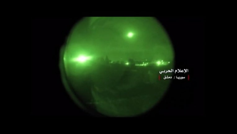 23f1e02f-syria airstrike night scope_KTVUb3fd_174.mp4_00.00.01.15_1523686481690.png.jpg