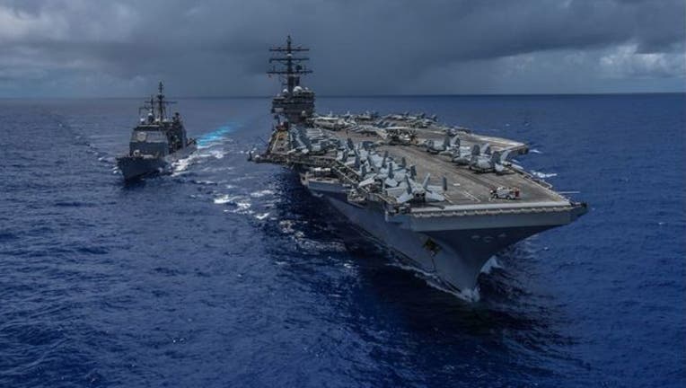 4a797446-uss-ronald-reagan-navy-7th-fleet_1539950404015-404023.jpg