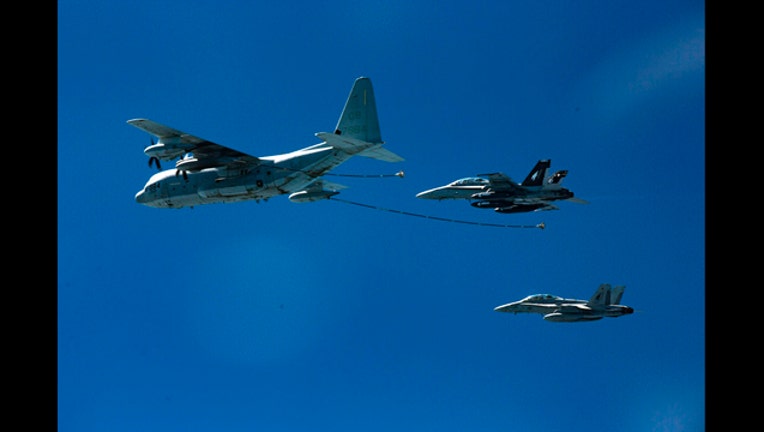 23e008a5-Japan US Military Plane Crash_1544068275092