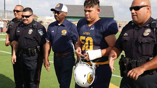 Officers vow to take care of fallen corporal's family, attend son's first football