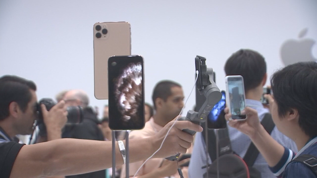 Die-hards wait in line to buy new iPhone 11; tips on Apple's new privacy update