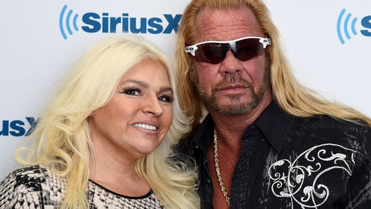 1e453056-GETTY_dog the bounty hunter and beth chapman_071419_1563112294168.png-402429.jpg