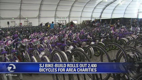 Hundreds of volunteers assemble 2,400 bicycles for Bay Area charities