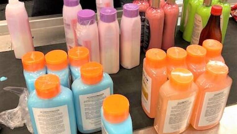 U.S. Customs and Border Protection says $400,000 worth of liquid cocaine was found in two dozen shampoo bottles in a man's luggage at a Houston airport.