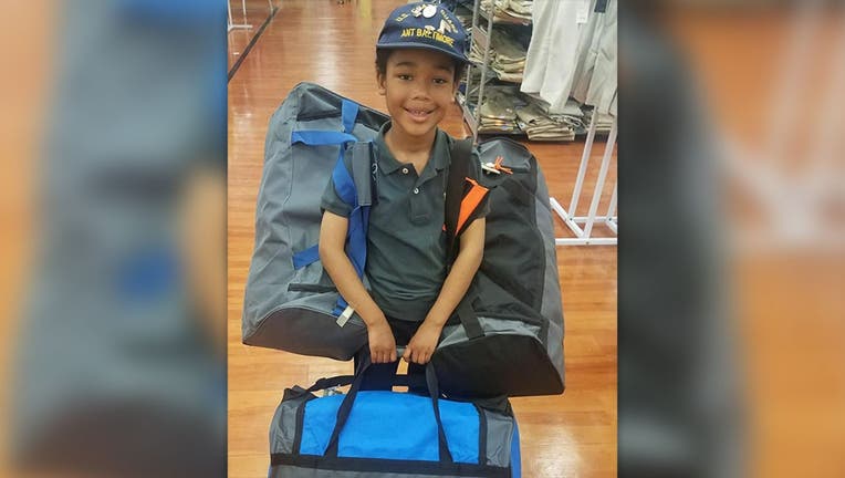 Tyler Stallings, 8, has been helping homeless veterans with