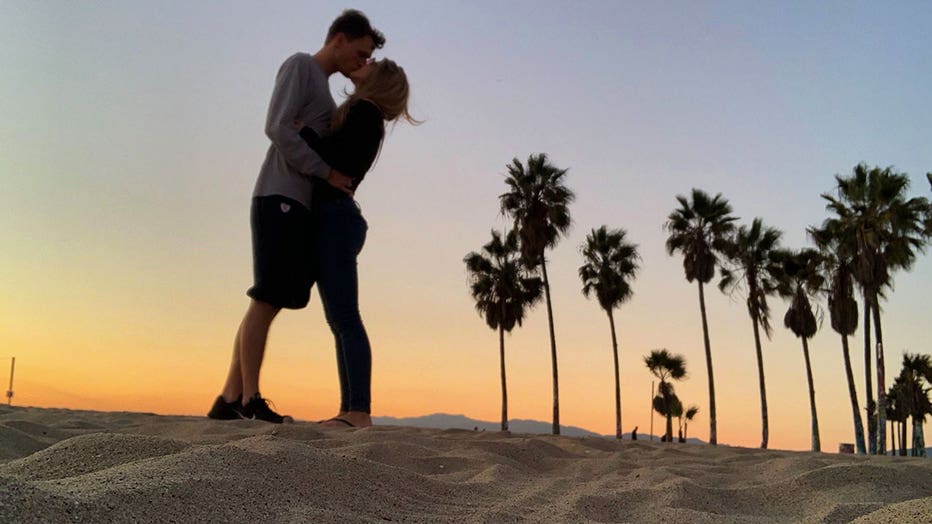 couple-sunset-kissing-beach-santa-monica-generic.jpg