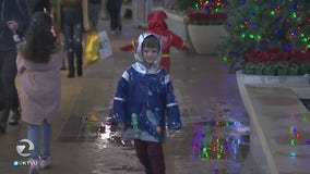 Shoppers in Walnut Creek brave the rain for holiday deals