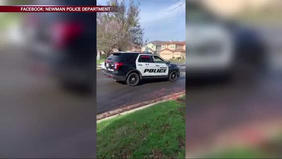 Newman police surprise slain officer's son with mini patrol car