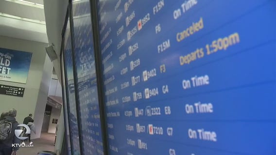 Airport delays and cancellations continue as rainy weather soaks Bay Area