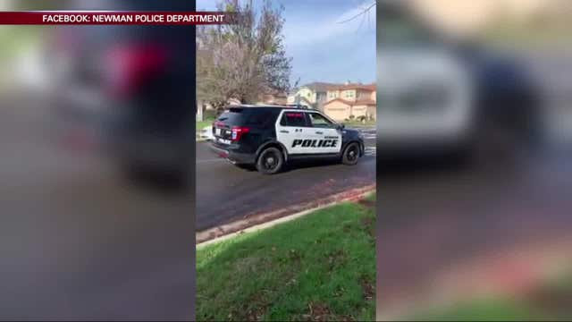 Newman police surprise slain officer's son with mini patrol car
