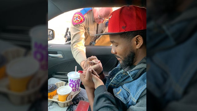 Trooper prays with couple he pulled over on the way to a funeral