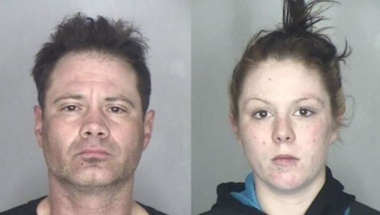 Two alleged porch pirates were arrested Tuesday after police found more than 100 items addressed to other people in their car.
