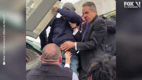 Cuomo helps rescue man from crash on highway