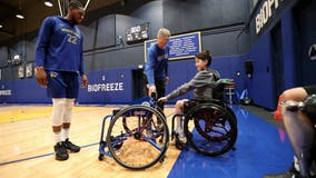 Young athlete with paraplegia receives surprise customized wheelchair from the Warriors