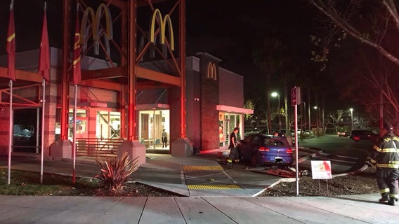 Vehicle jumps curb narrowly missing San Jose McDonalds, driver flees