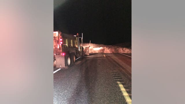 Piles of tumbleweed trapped cars along Washington highway on New Year's Eve