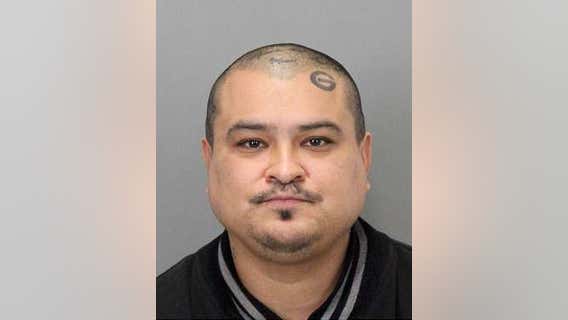 Man in-custody charged with murder after review of victim's death in 2018