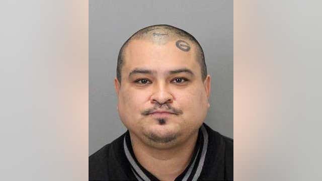 Man in-custody charged with murder after review of victim's death in 2018