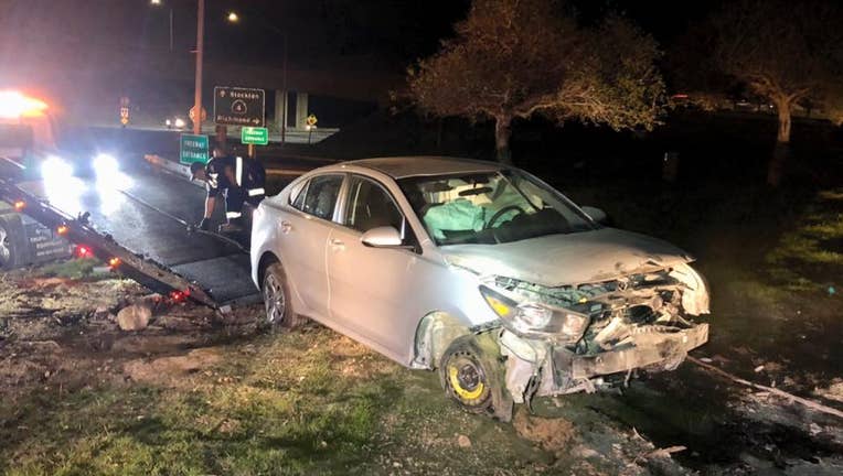 A Kia burst into flames after teens crashed it into an embankment in Concord.