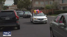 Teachers, students caravan with signs and balloons during quarantine