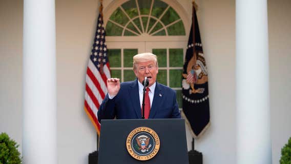 Trump defends extending virus guidelines as spread continues