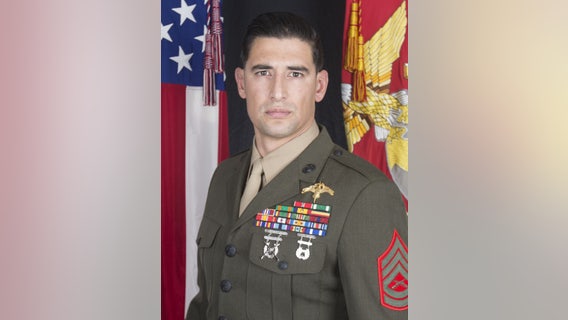 Thousands turn out for a memorial parade for fallen California Marine