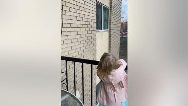 From a distance, young Minnesota girl befriends neighbor during COVID-19 outbreak