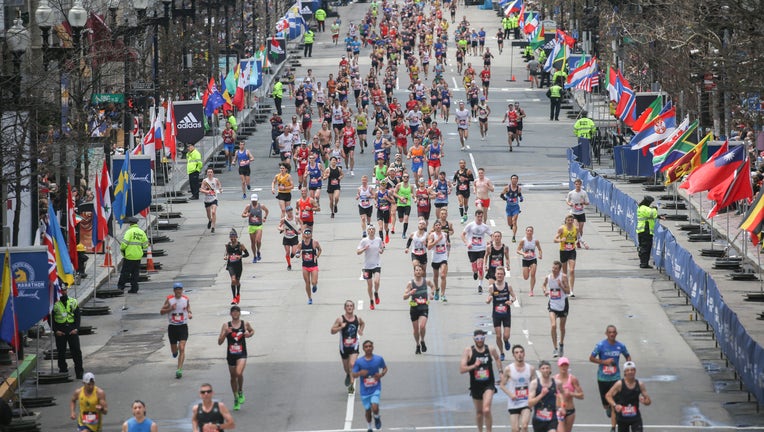 Runners make their way towards the finish line of the 123rd Boston Marathon on Monday, April 15, 2019 in Boston, Massachusetts.